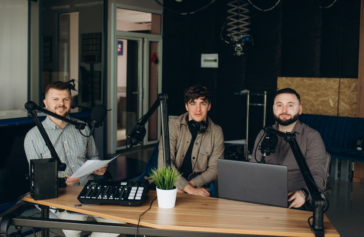 side-view-of-two-radio-hosts-recording-podcast-in-2023-11-27-05-04-08-utc.jpg